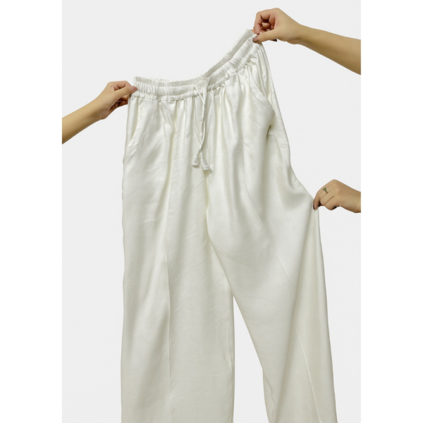 Ivory wide-leg linen pants full length view
