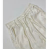 Ivory linen wide-leg pants with elastic waistband and drawstring