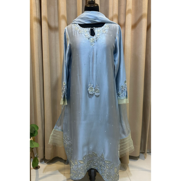 Front view of Opal Elise pastel blue hand embellished sheesha silk kaftan on Silhouette by SL