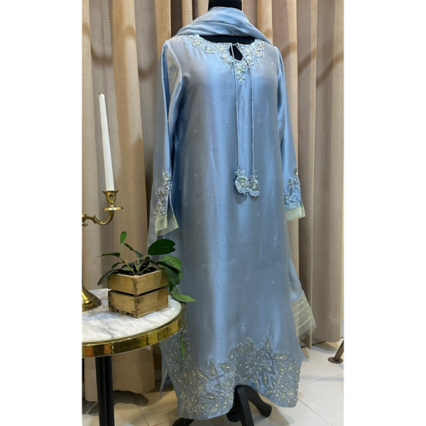 Neckline embroidery detail of Opal Elise pastel blue kaftan on Silhouette by SL